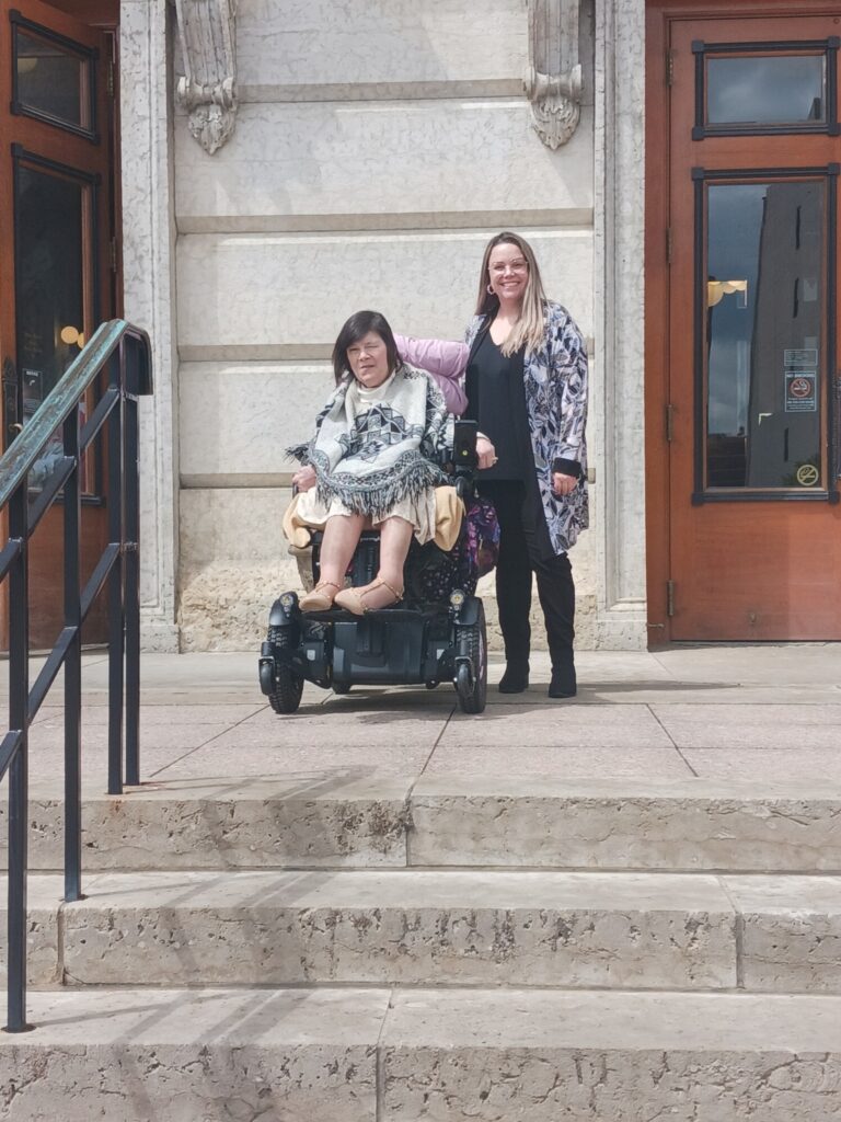 Renee Wood and Brittanie Maddox pose at the entrance to the Ohio Statehouse